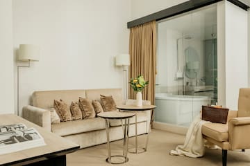 a room with a couch and a tub