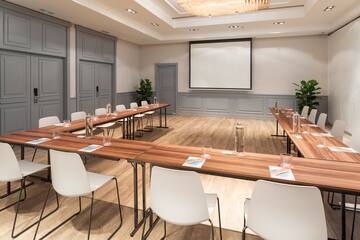 a room with tables and chairs