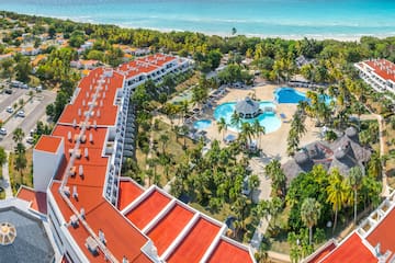 a resort with a pool and trees