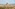 Aerial view of a historic Maltese city with a grand domed cathedral.