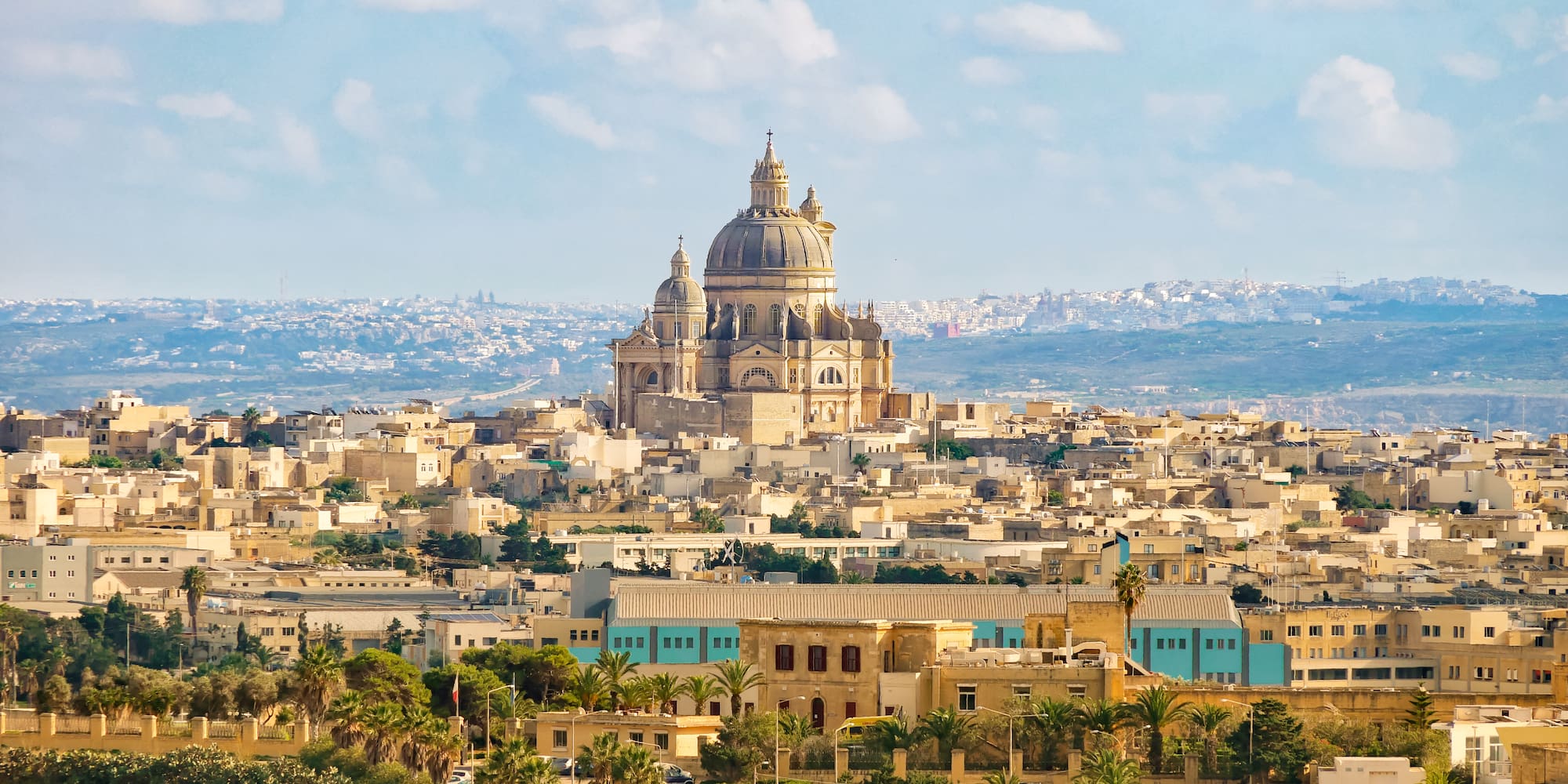 a large building on a hill