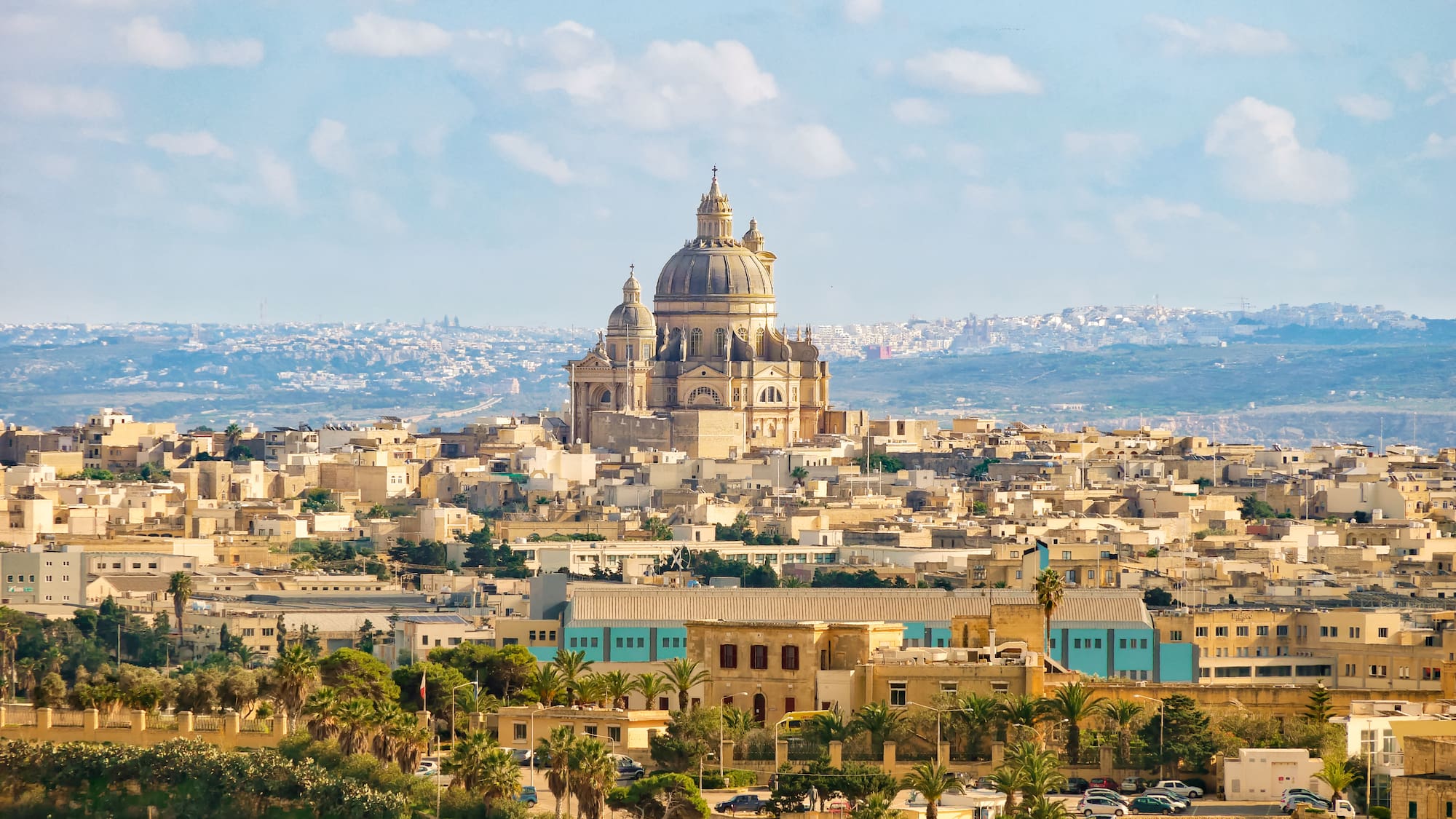 a large building on a hill