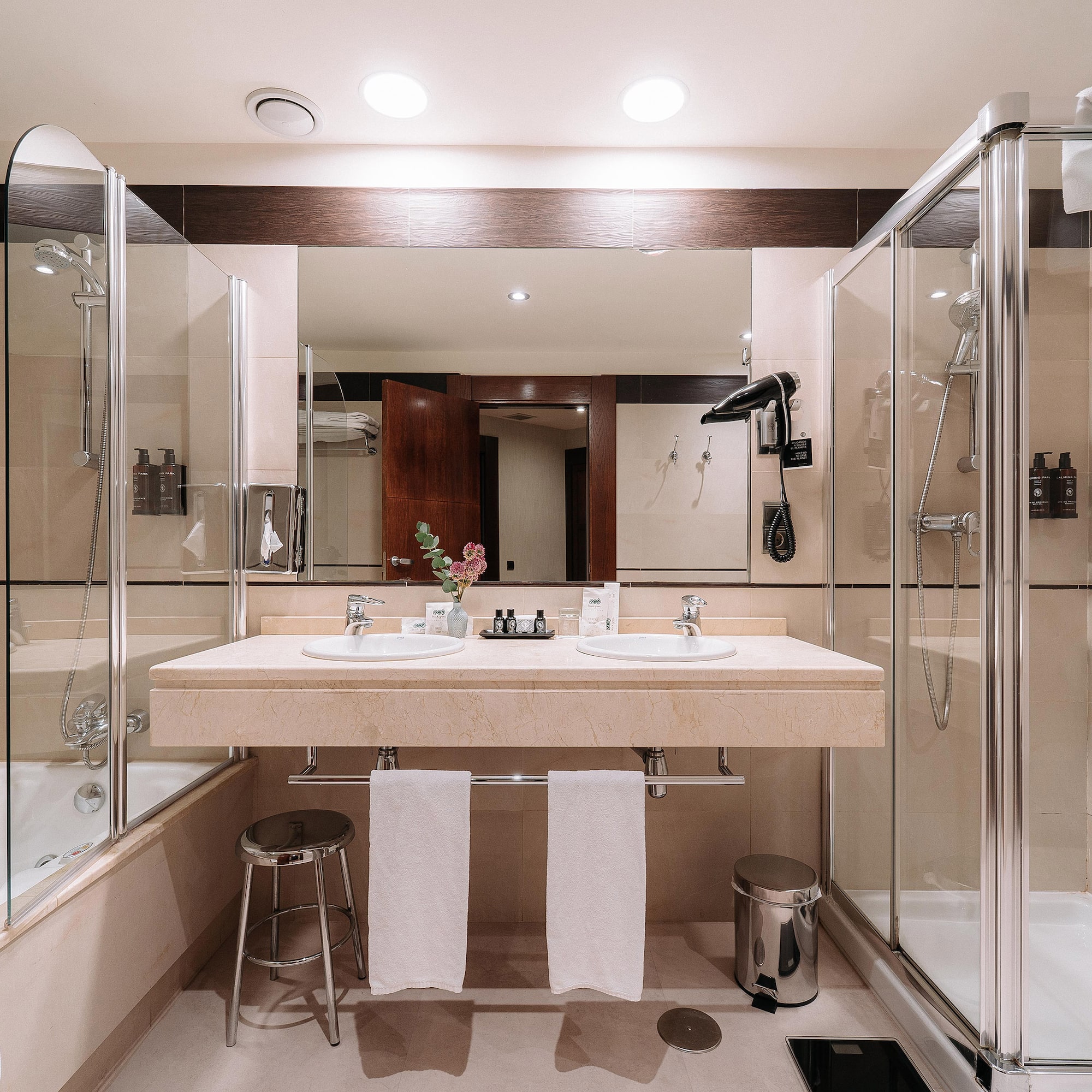 a bathroom with a shower and sink