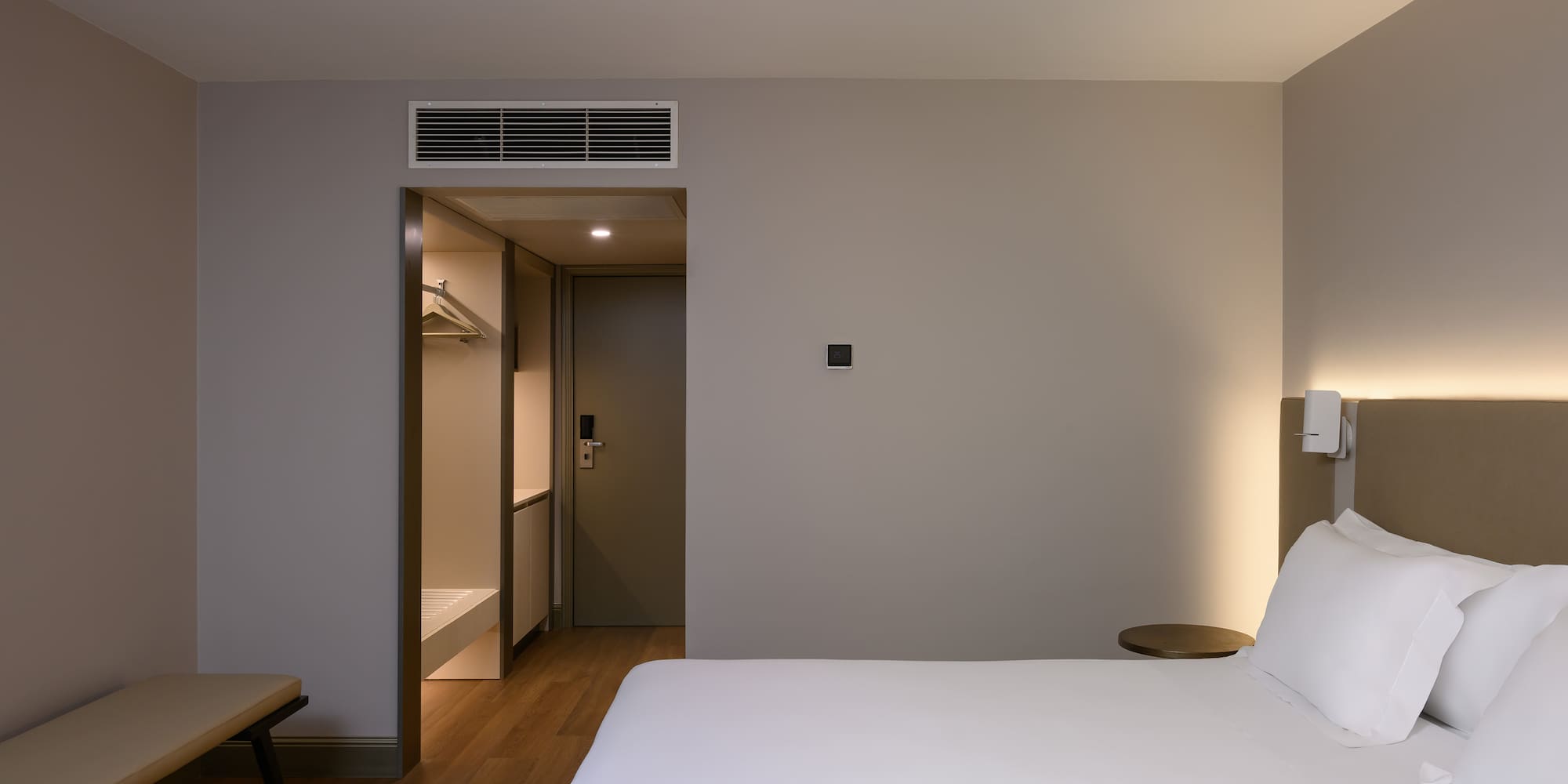 a room with a bed and a shower