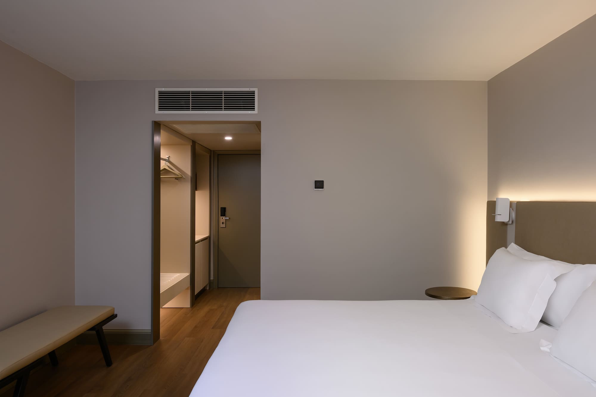 a room with a bed and a shower