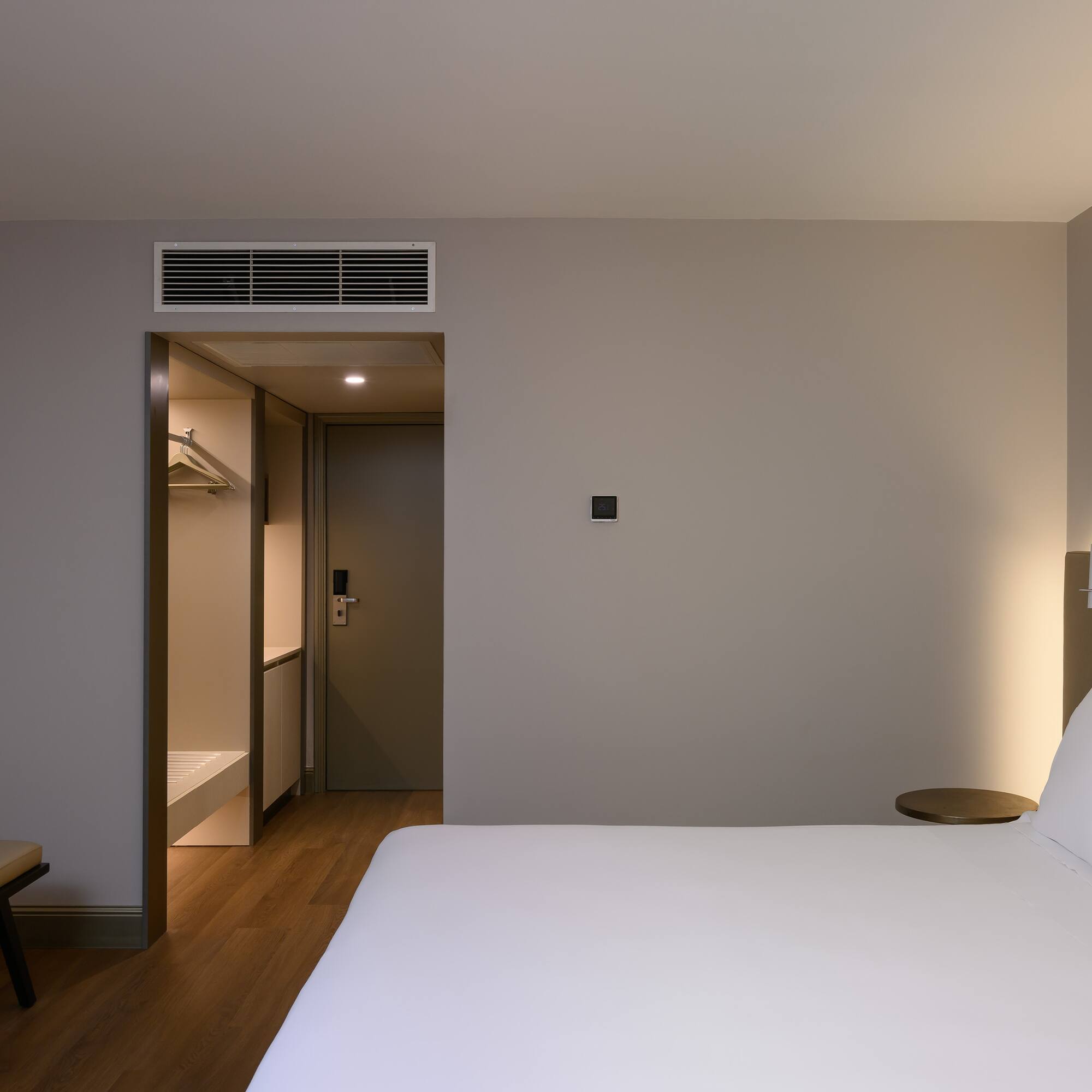 a room with a bed and a shower