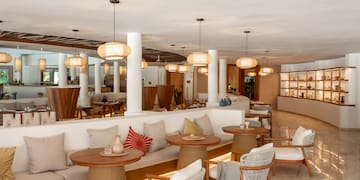 a room with tables and chairs