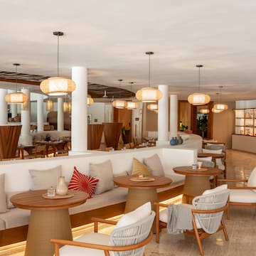 a room with tables and chairs