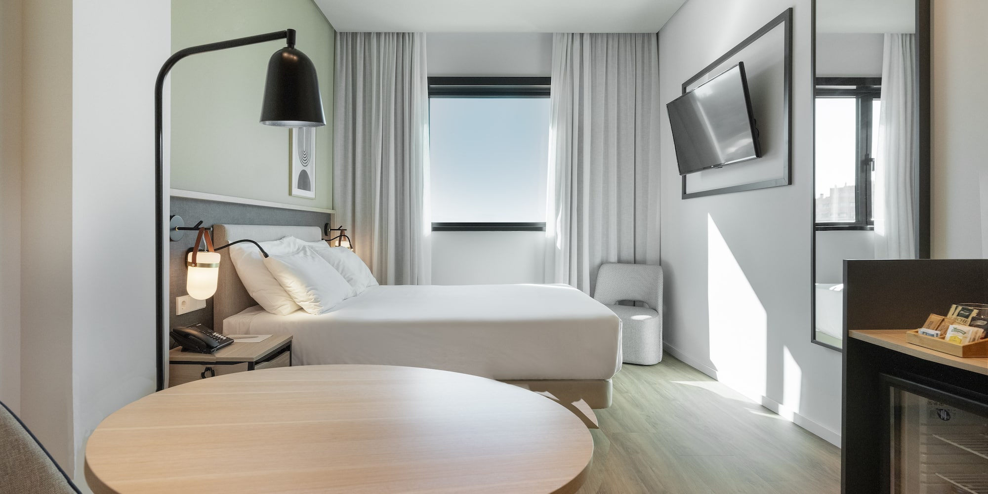 a room with a bed and a table