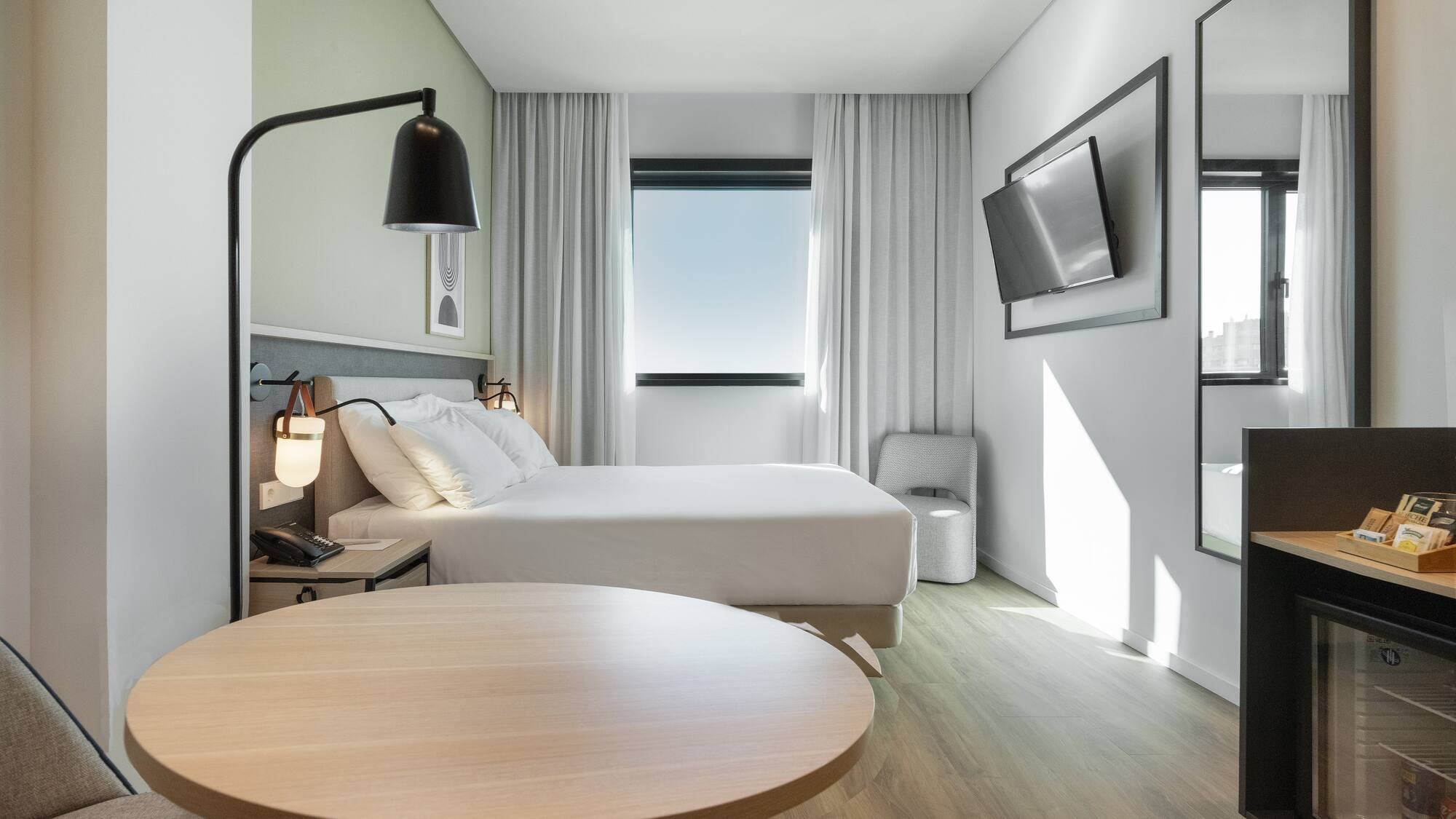 a room with a bed and a table