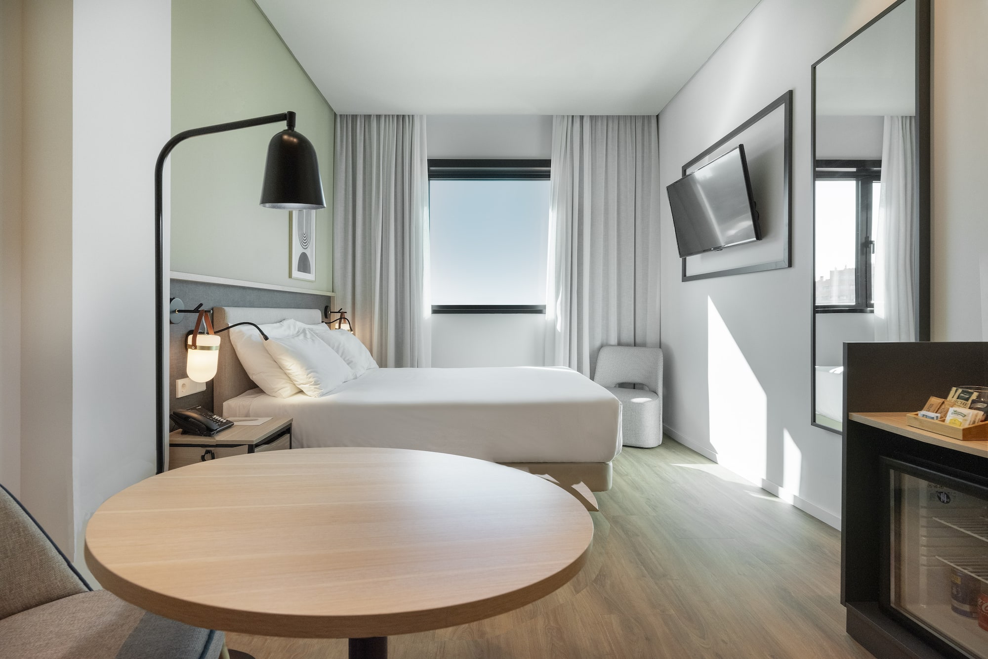 a room with a bed and a table