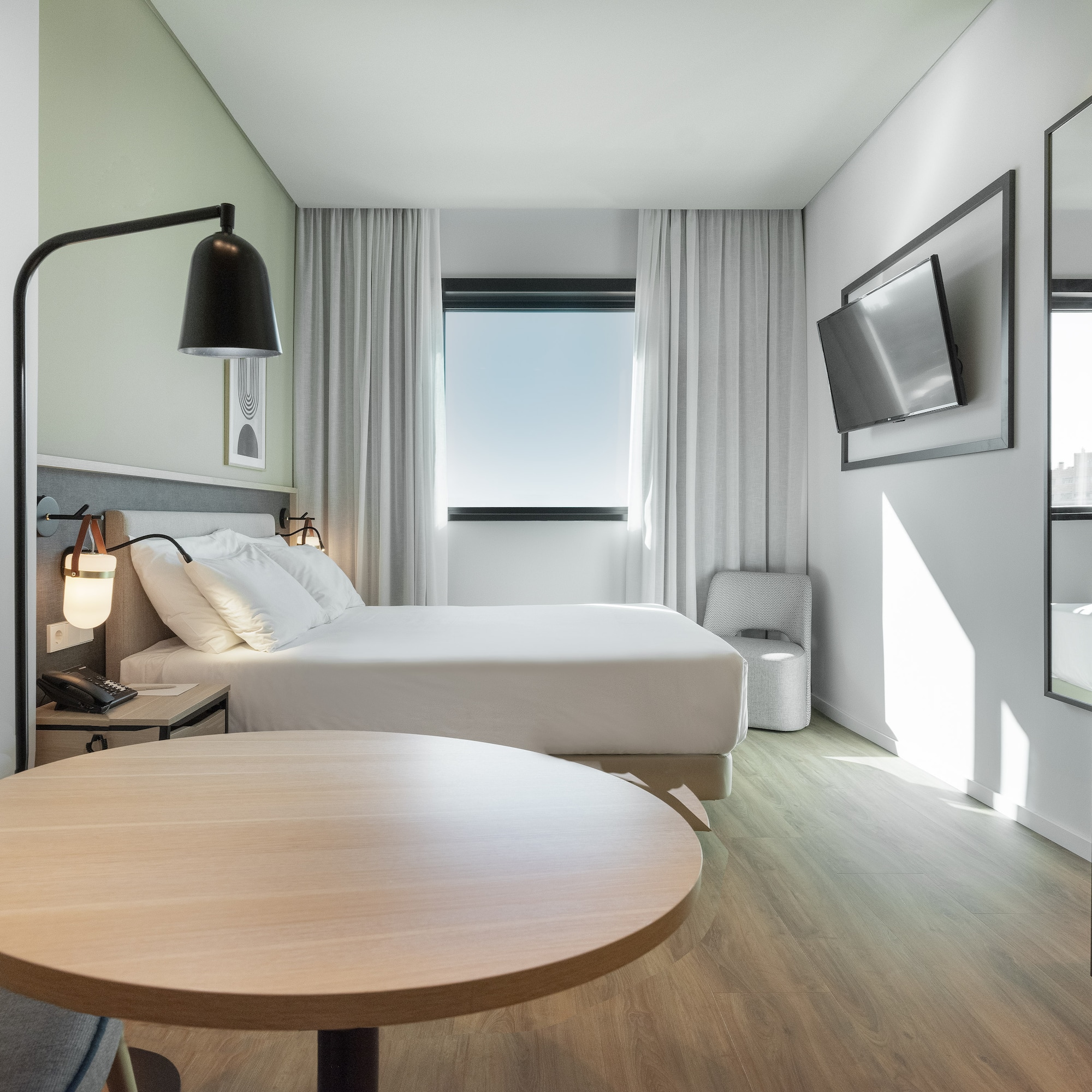 a room with a bed and a table