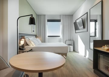 a room with a bed and a table