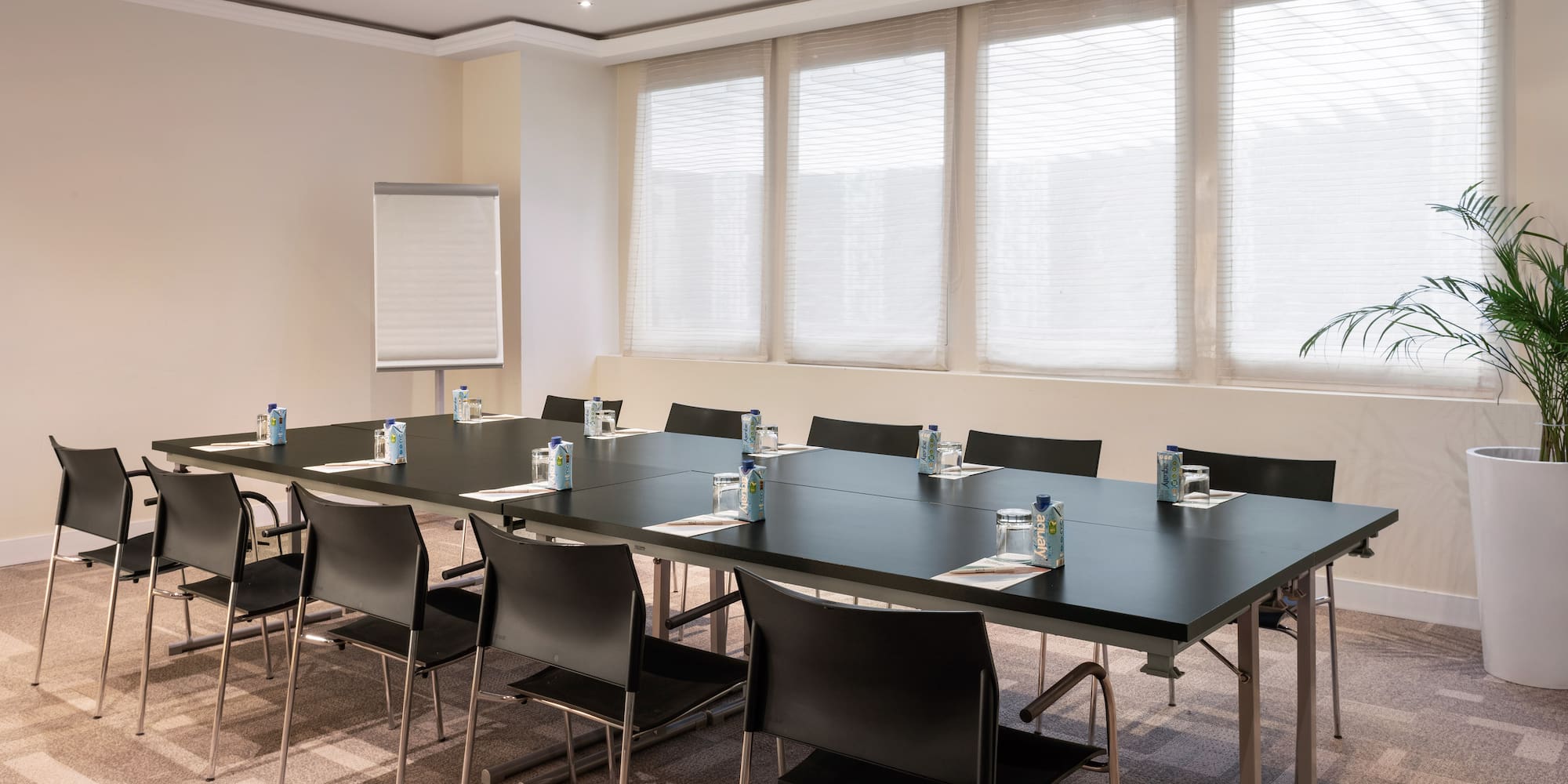 a room with a table and chairs