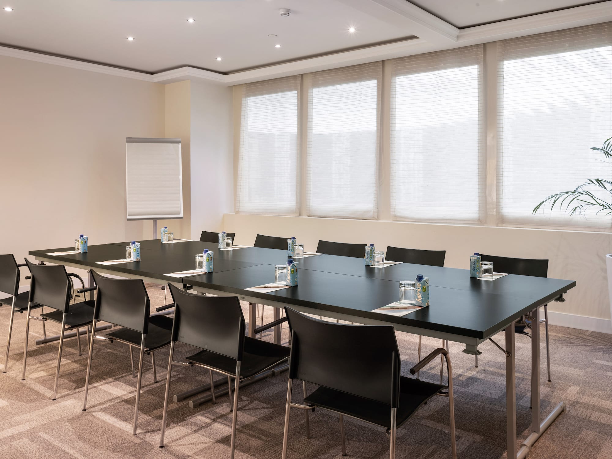 a room with a table and chairs