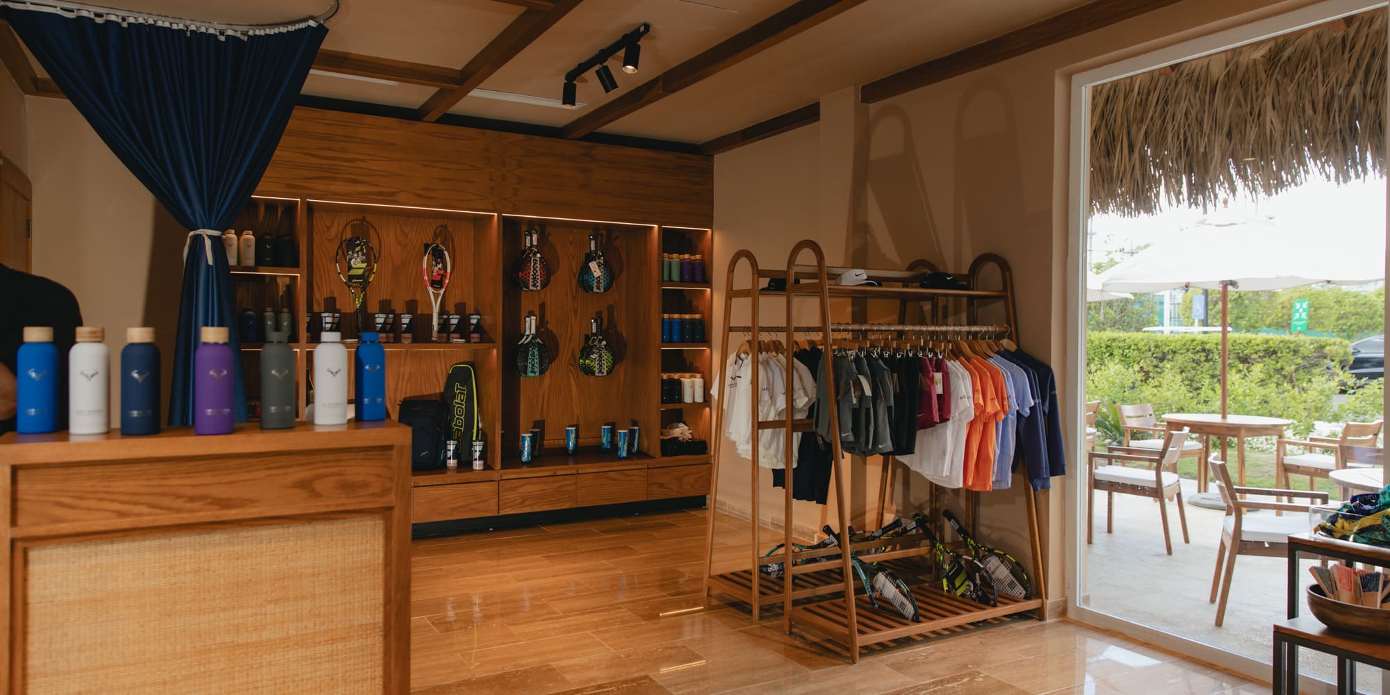 a store with shelves and shelves with clothes and other items