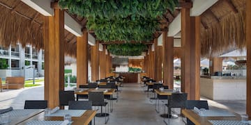 a restaurant with tables and chairs