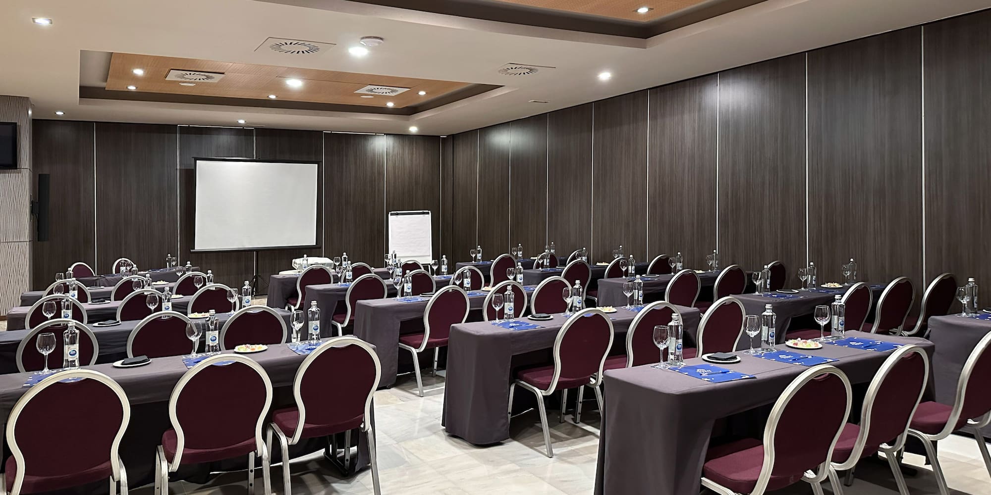 a room with tables and chairs