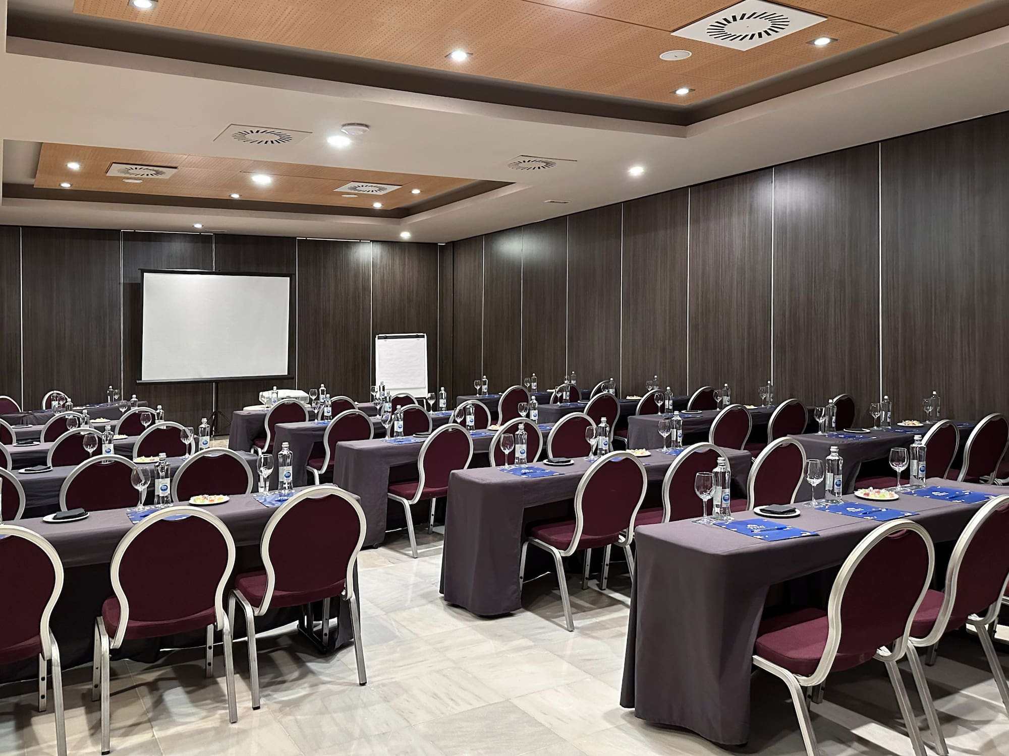 a room with tables and chairs