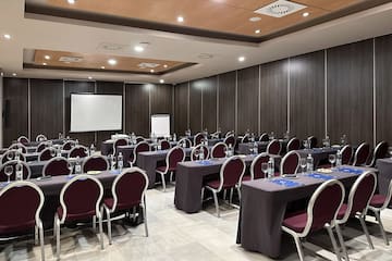 a room with tables and chairs