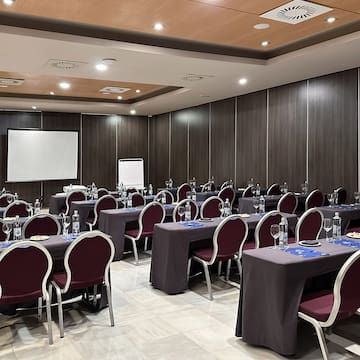 a room with tables and chairs