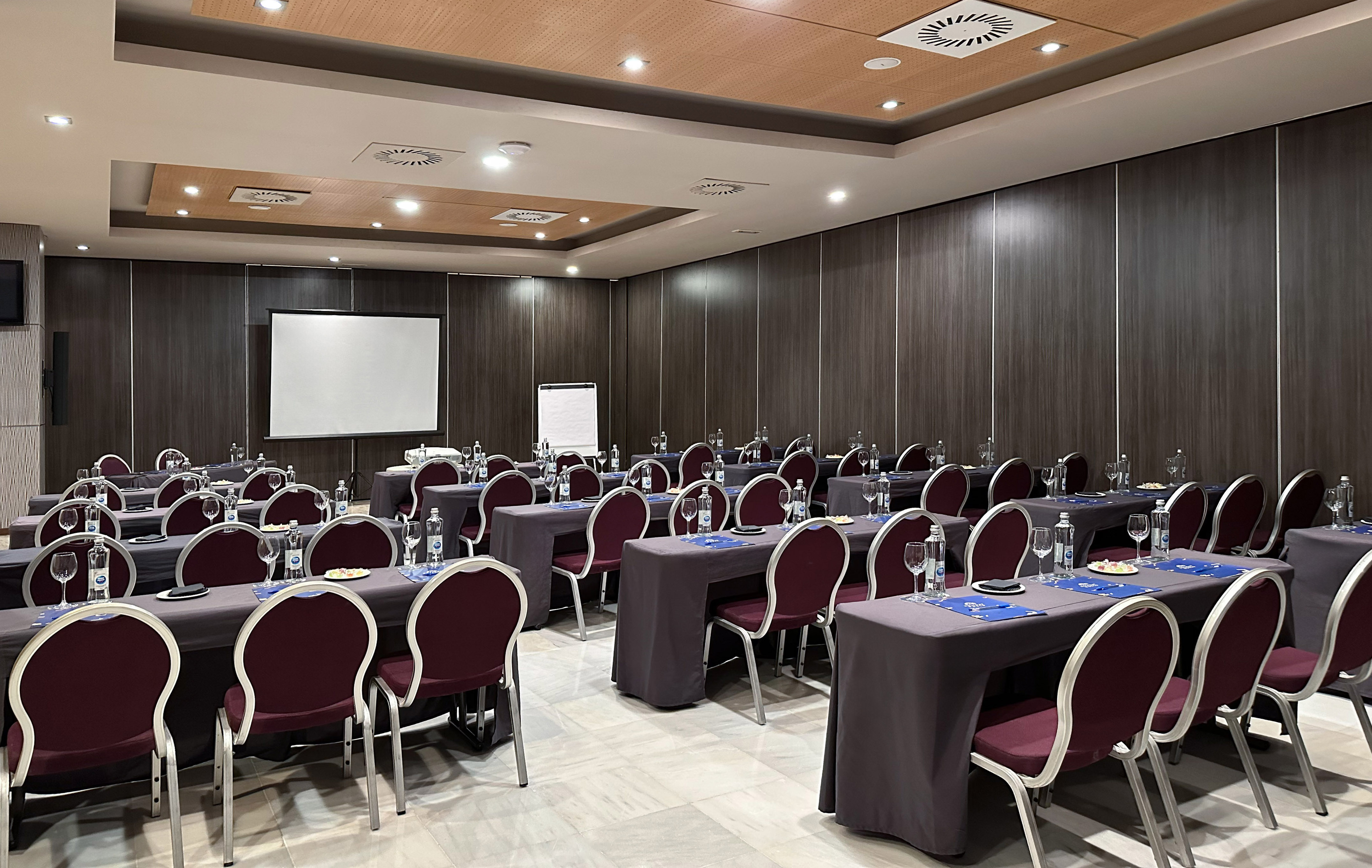 a room with tables and chairs