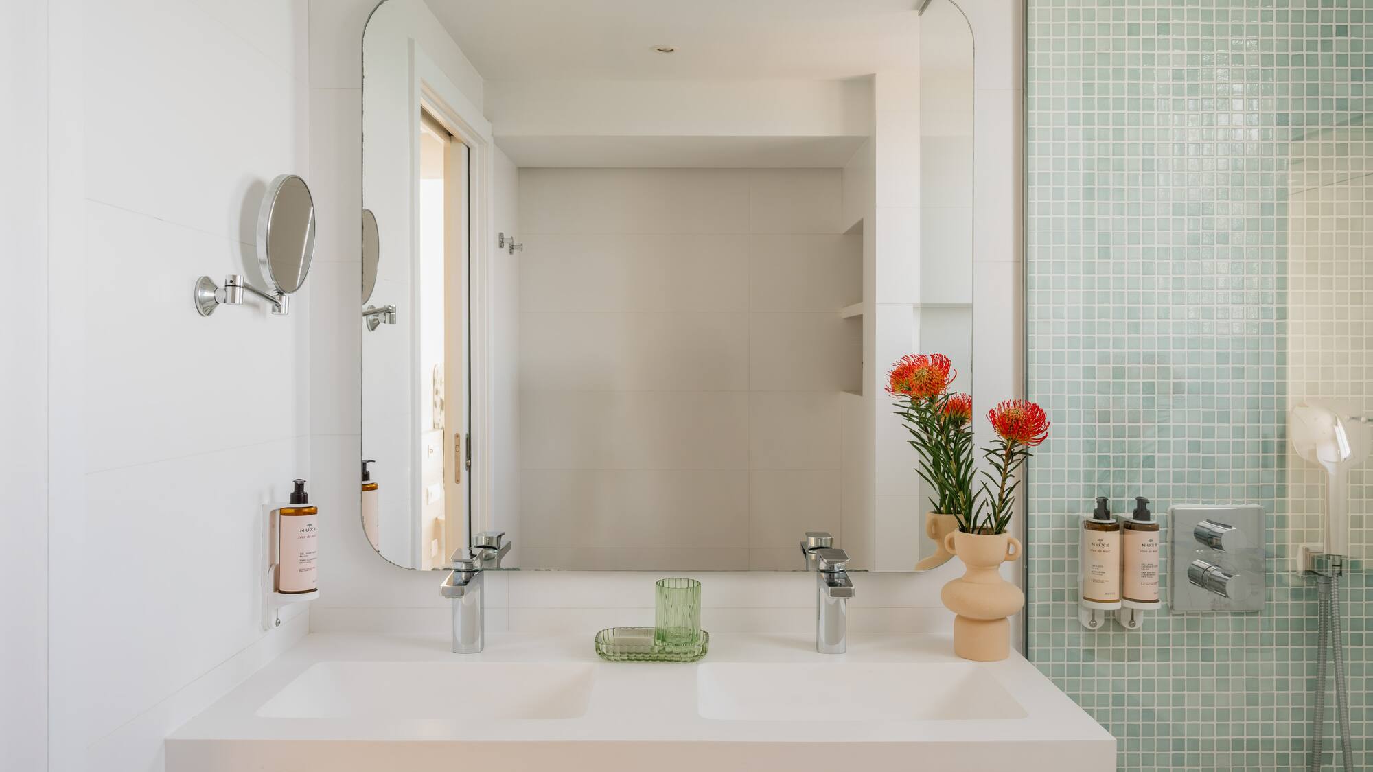 a bathroom with a mirror and sink