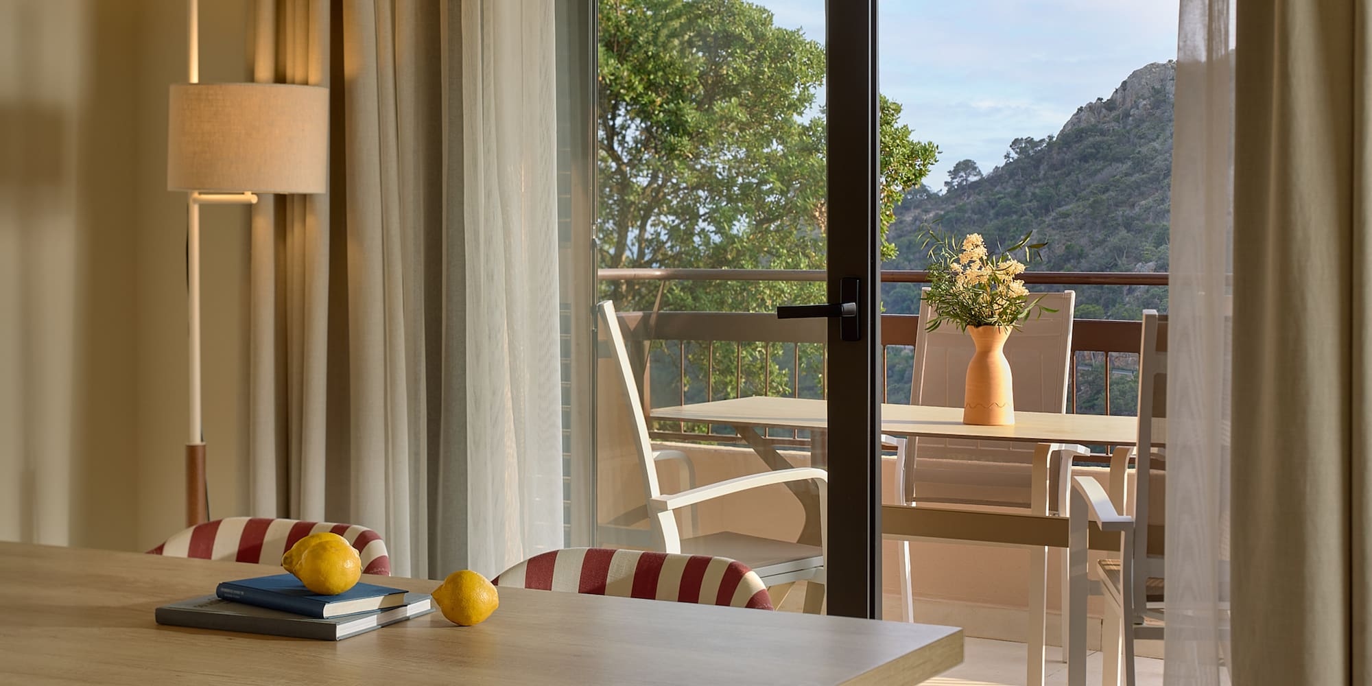 a room with a table and chairs and a table and chairs