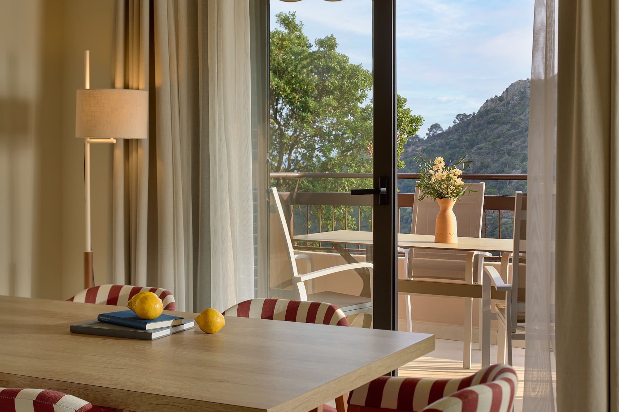 a room with a table and chairs and a table and chairs