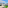 Rooftop terrace with sun canopy, daybed, green turf, and ocean view.