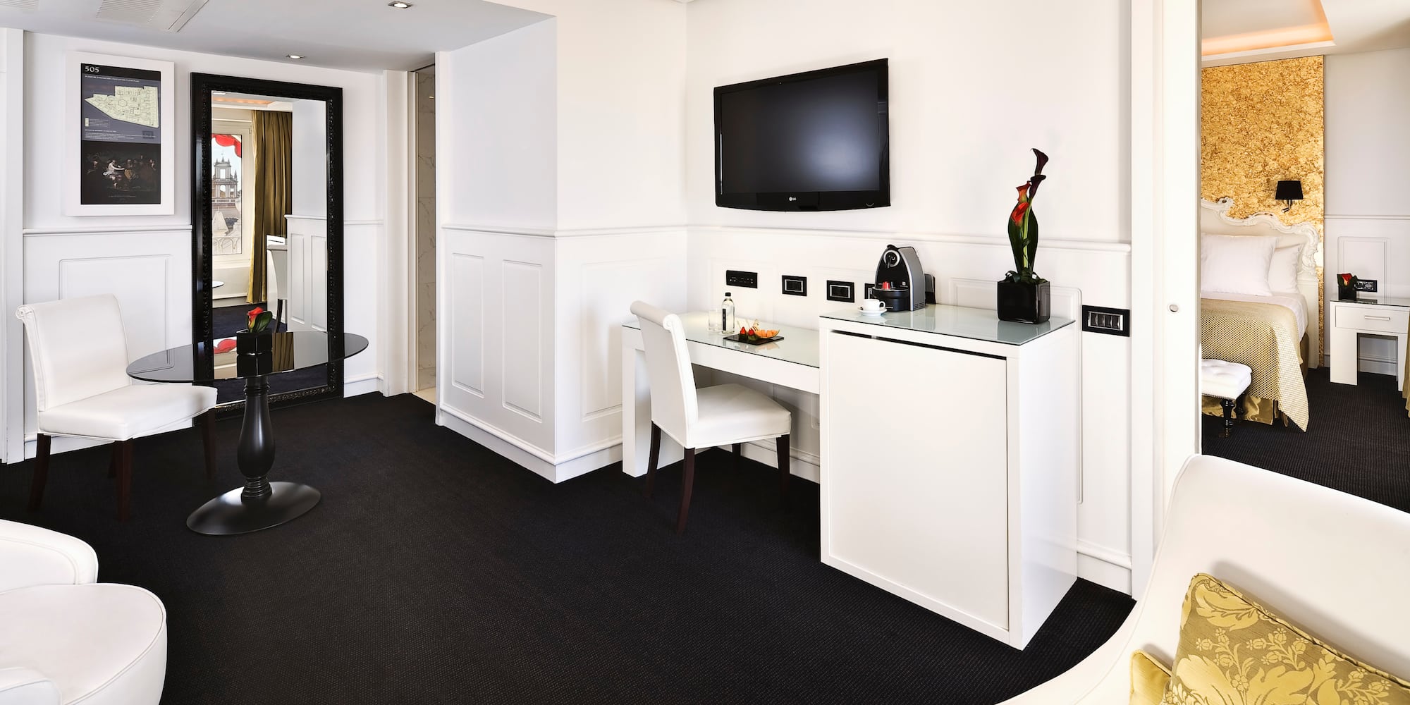 a room with a television and a table