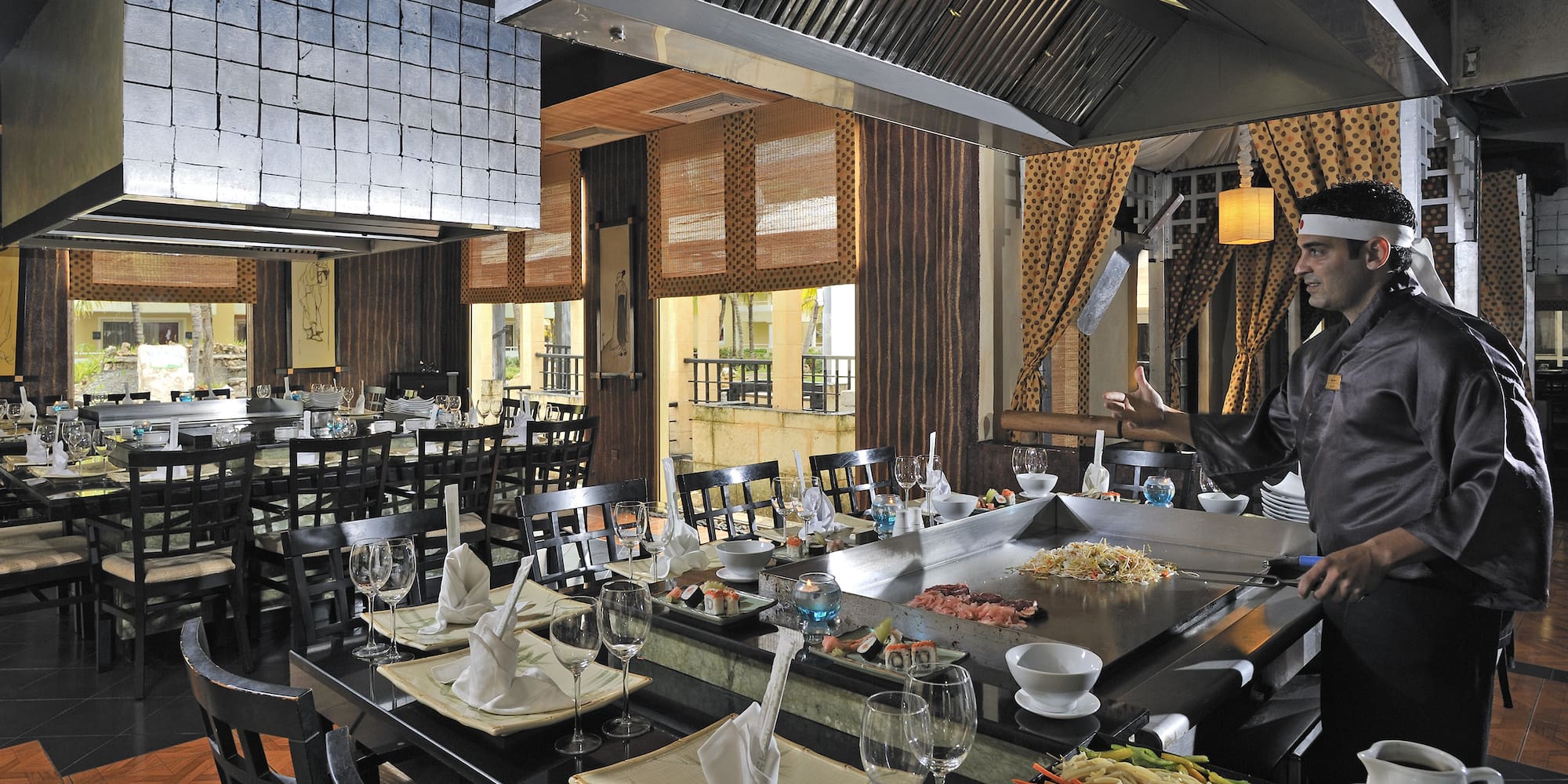 a restaurant with a large table set up