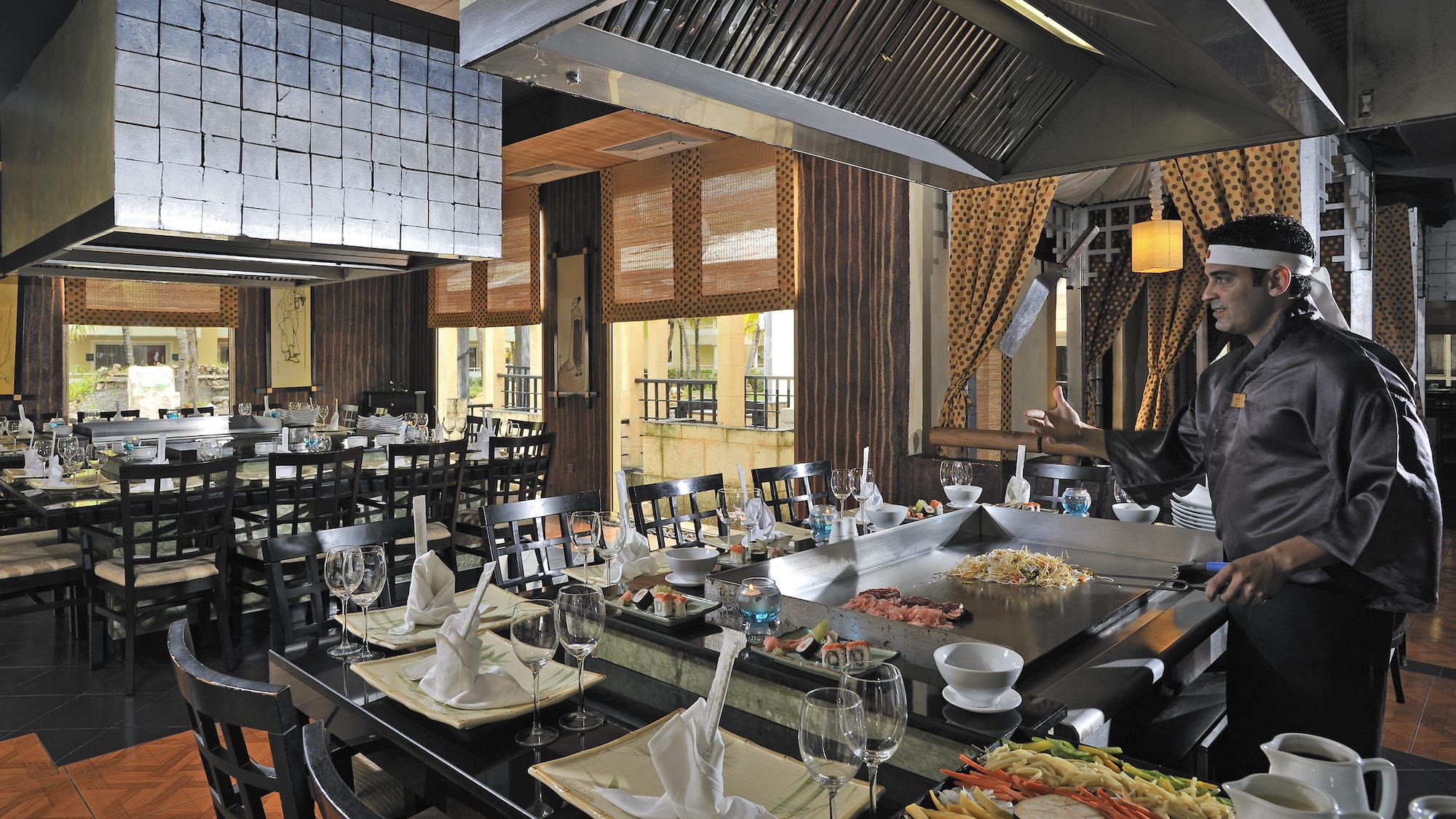 a restaurant with a large table set up