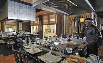 a restaurant with a large table set up