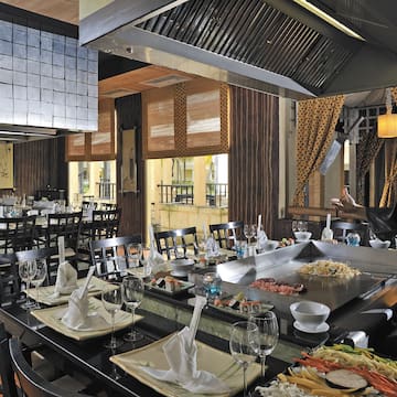 a restaurant with a large table set up