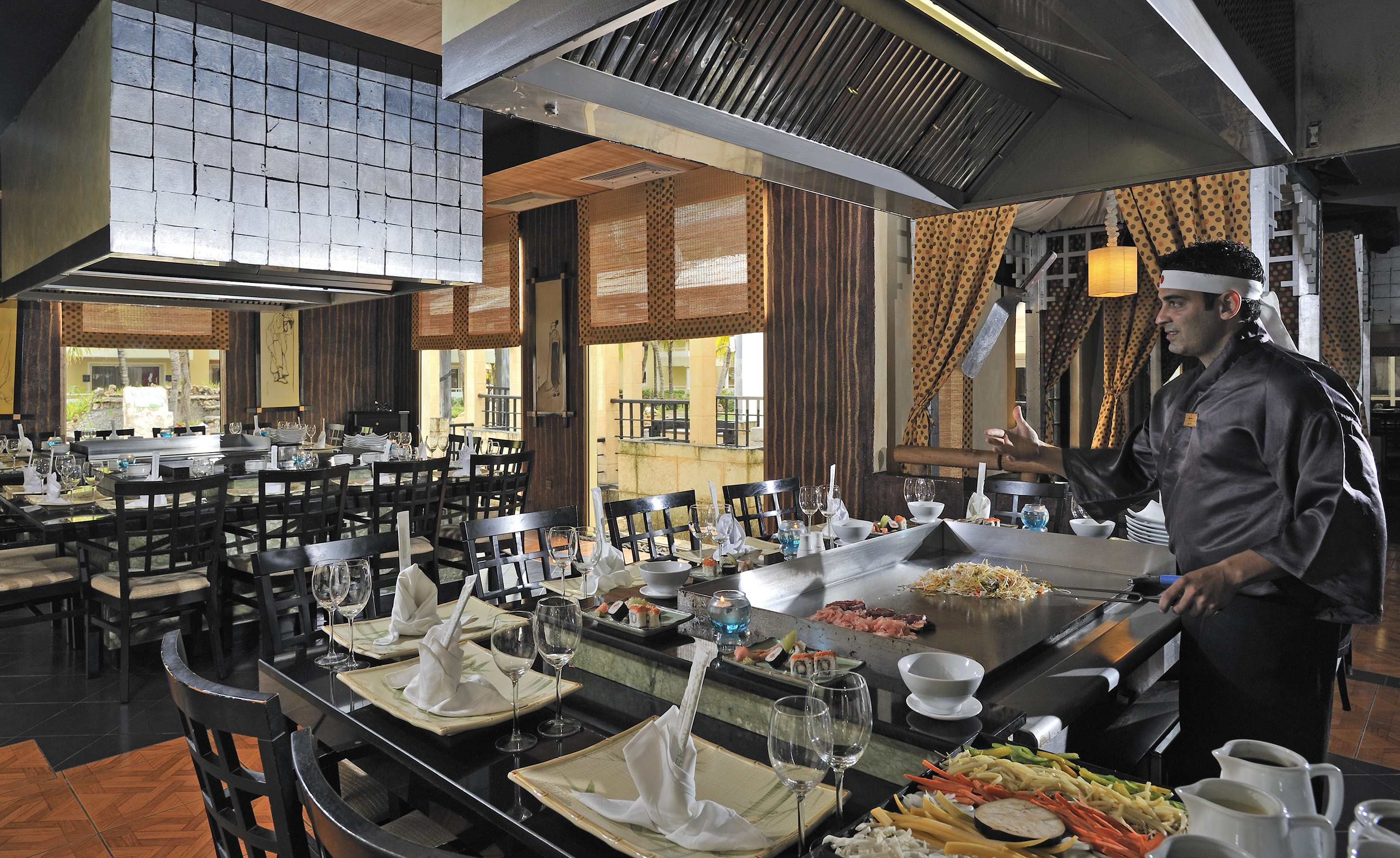 a restaurant with a large table set up