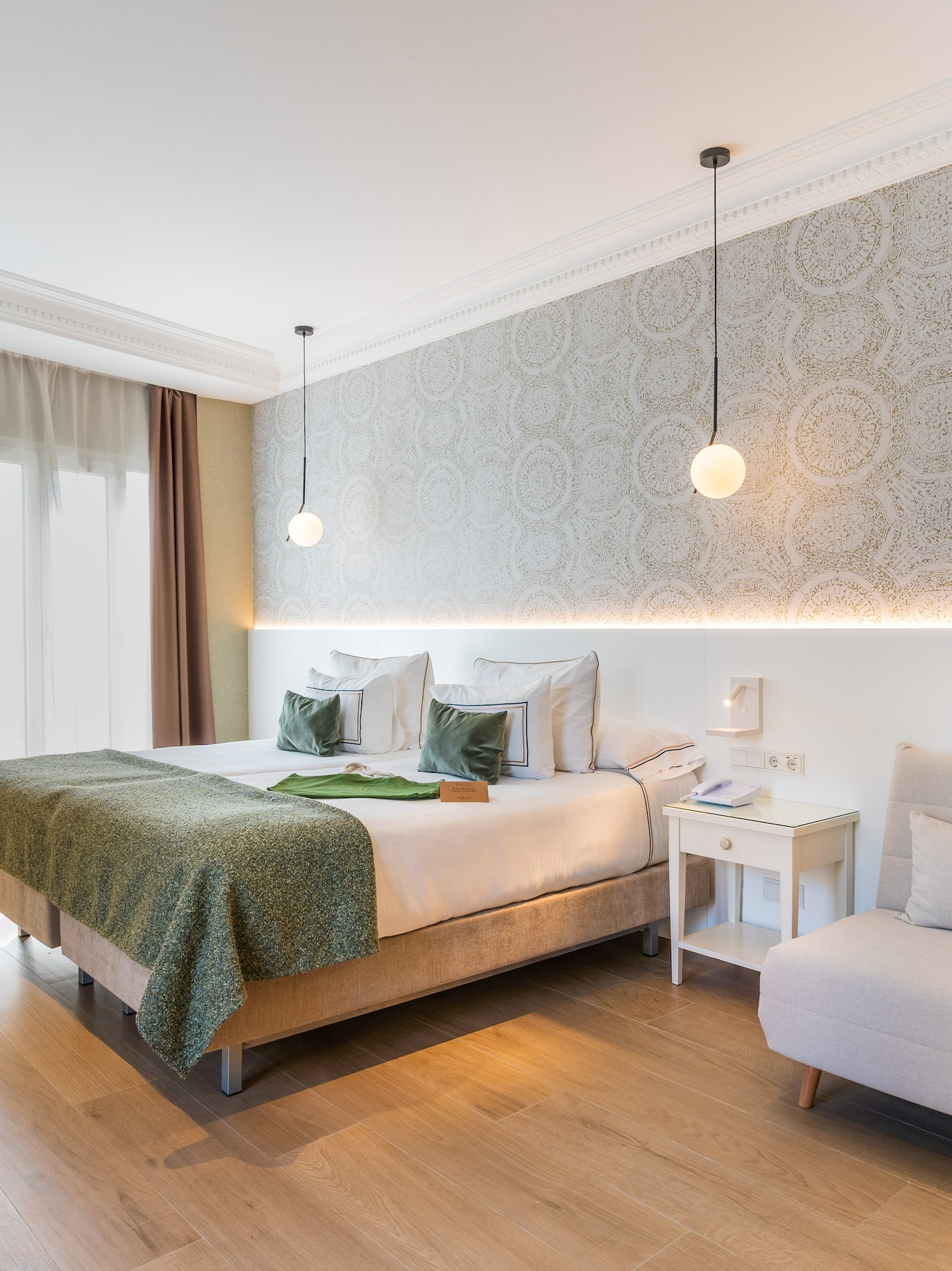 a room with a bed and a chair