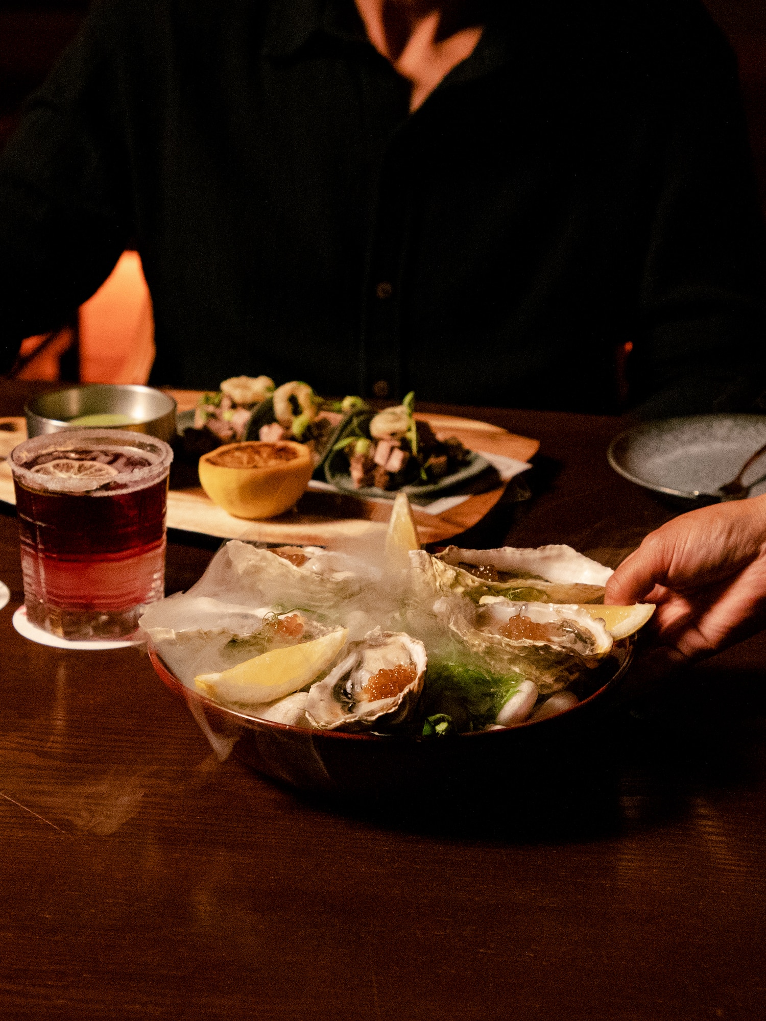 a person holding a plate of food