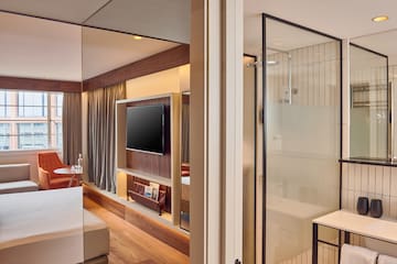 a room with a tv on the wall