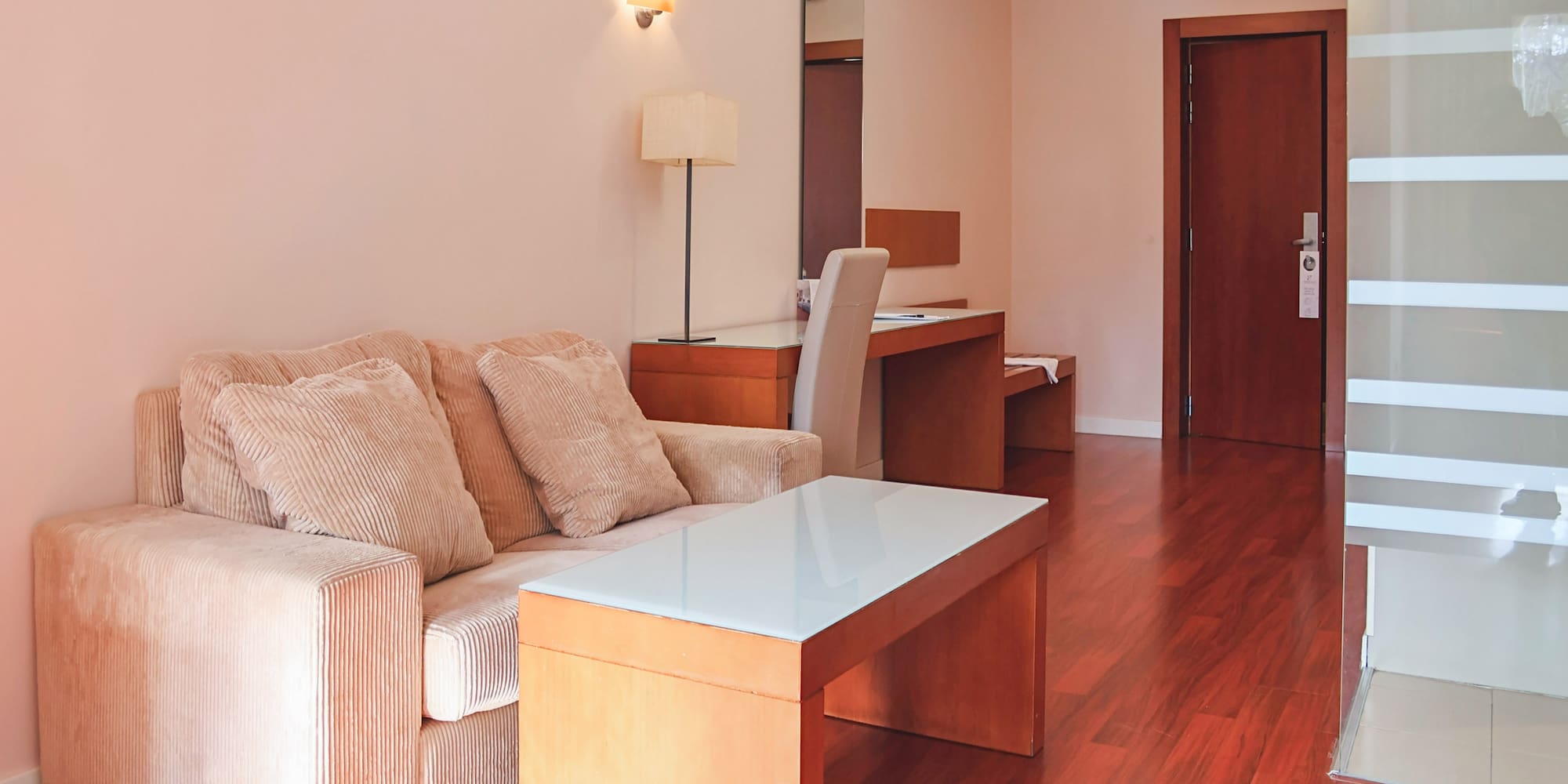 a living room with a couch and a table