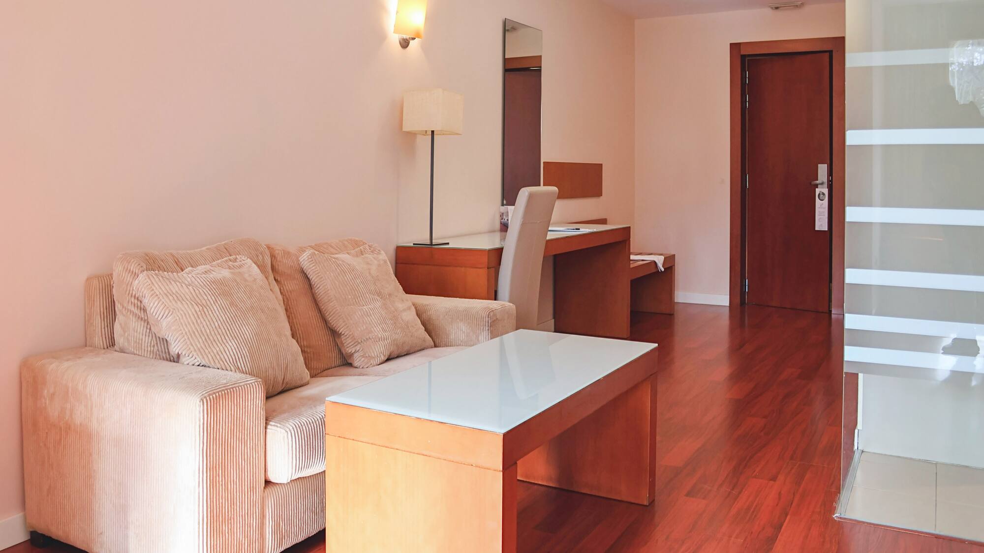 a living room with a couch and a table