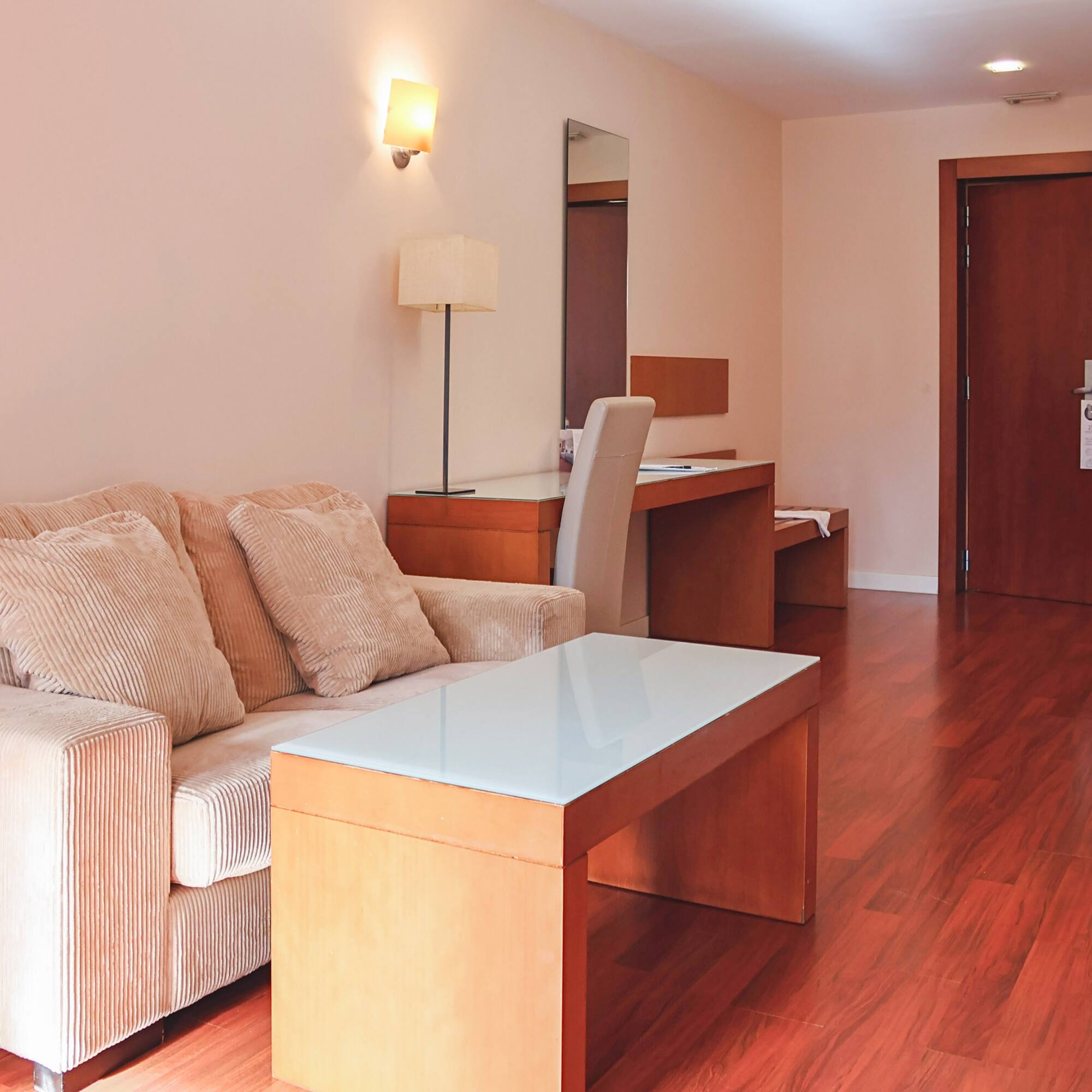 a living room with a couch and a table