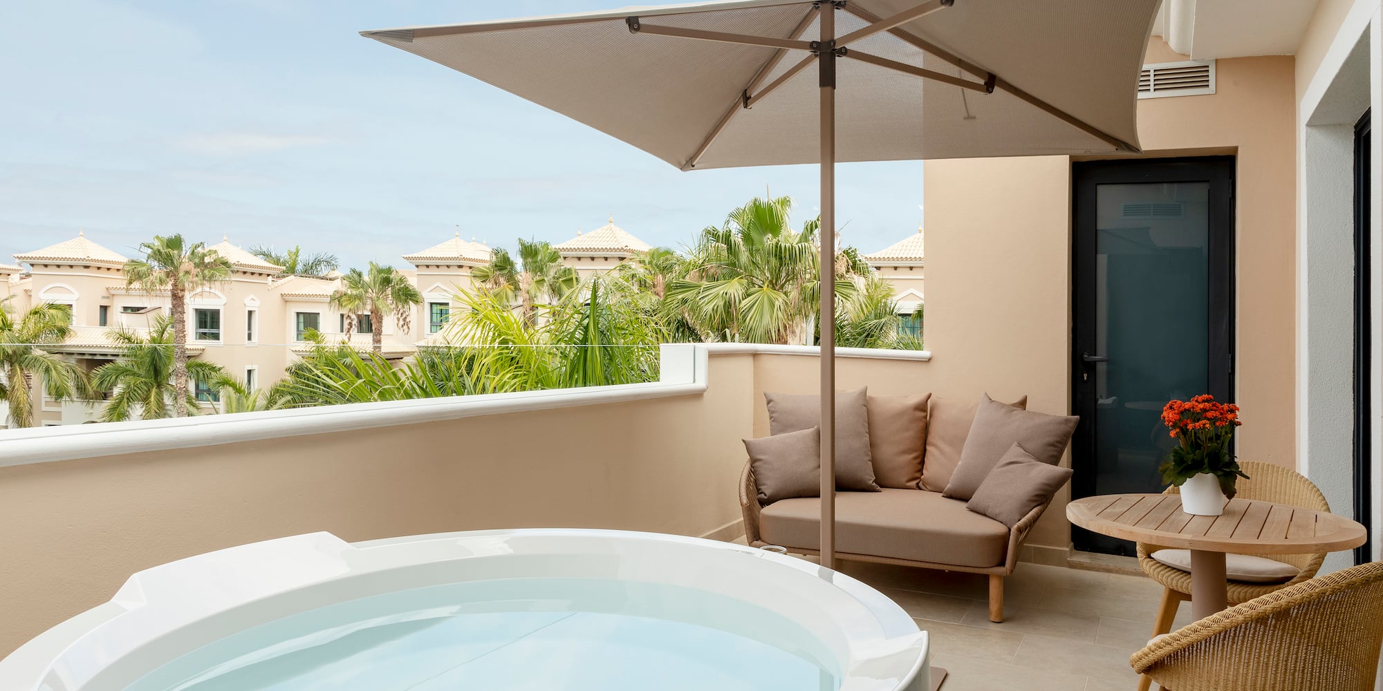 a hot tub on a balcony