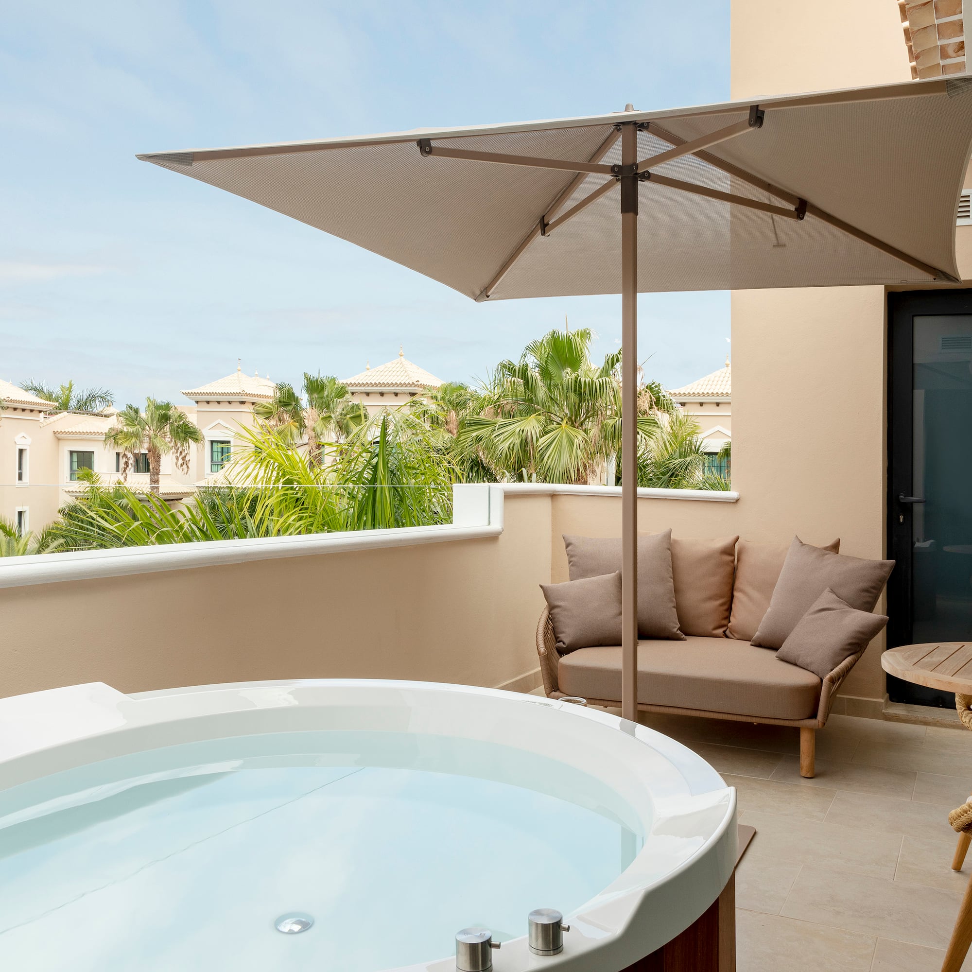 a hot tub on a balcony