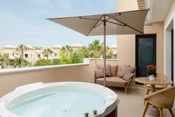 a hot tub on a balcony