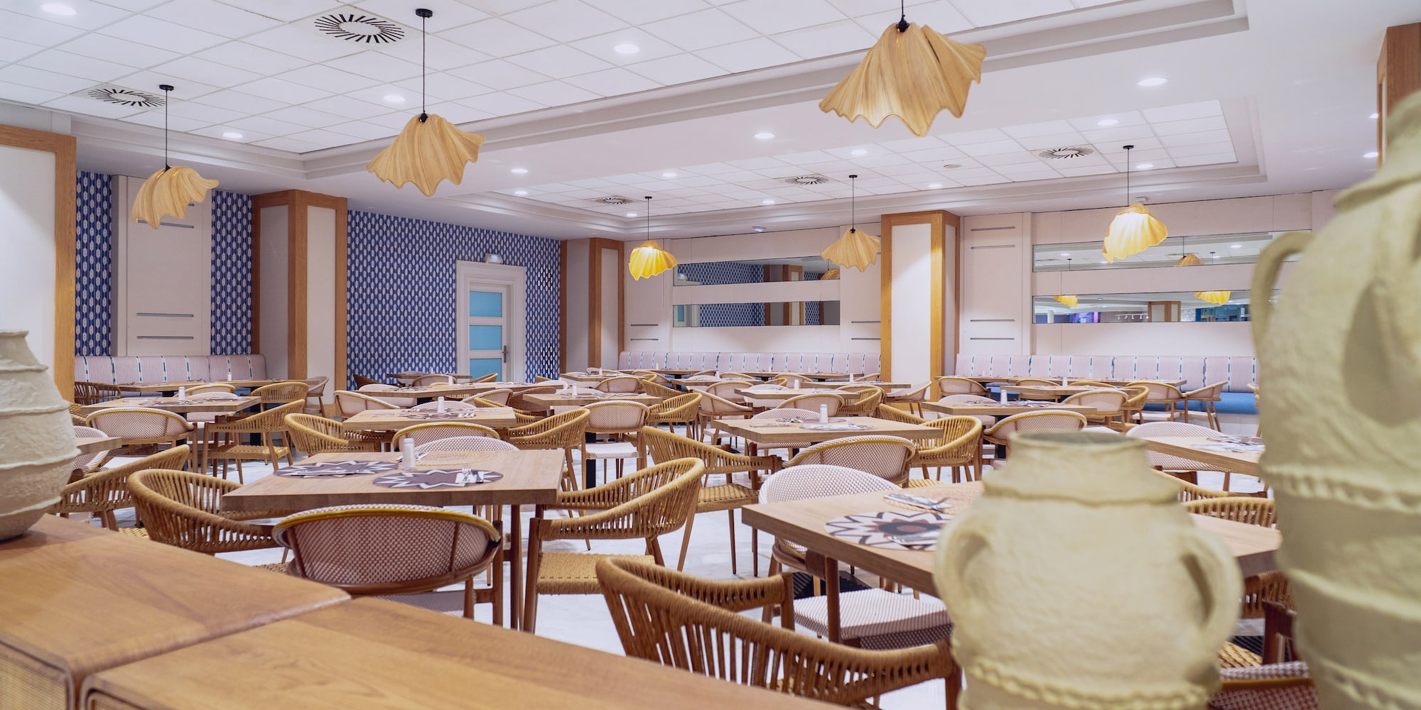 a room with tables and chairs