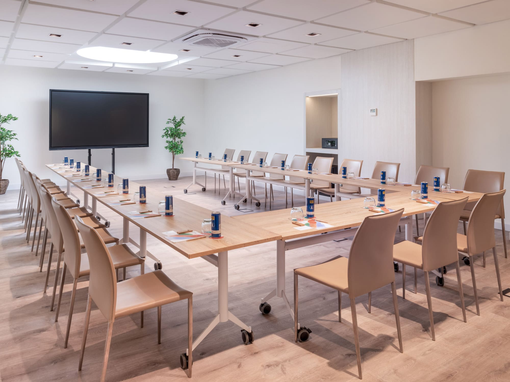 a room with a large table and chairs