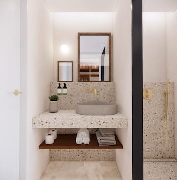 a bathroom with a sink and mirror