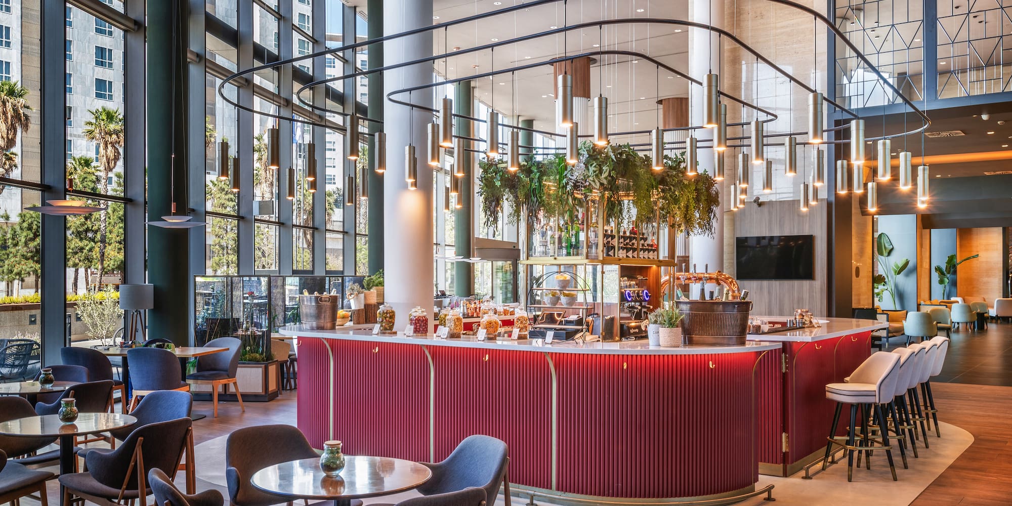 a restaurant with a bar and chairs