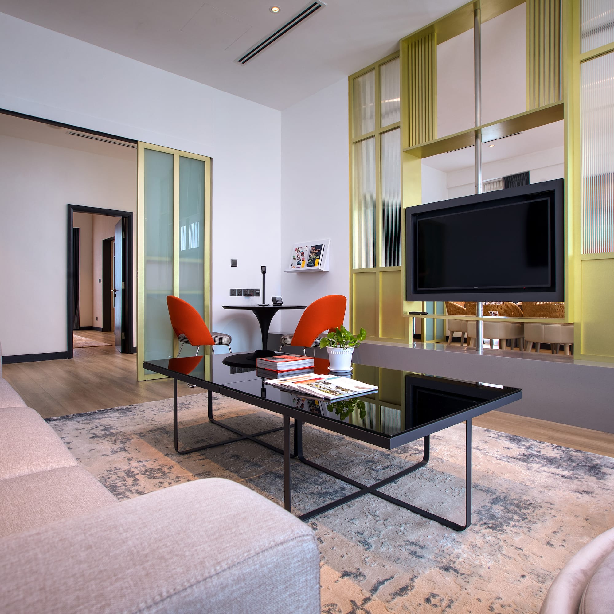 a living room with a tv and a couch